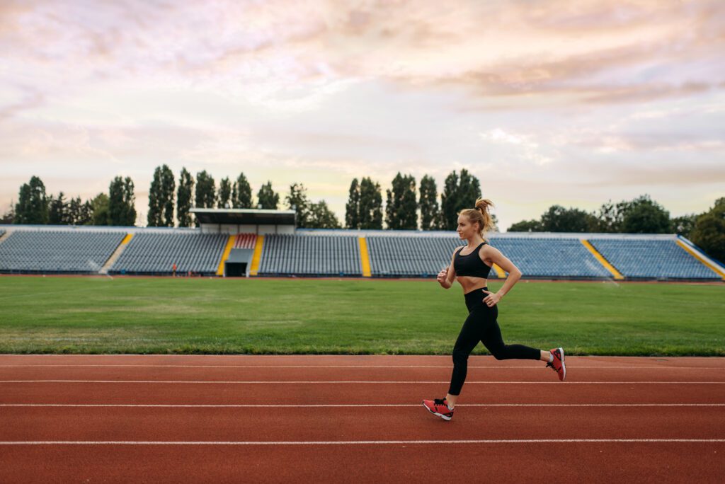 female runner jogging training on stadium 2024 12 04 20 48 44 utc
