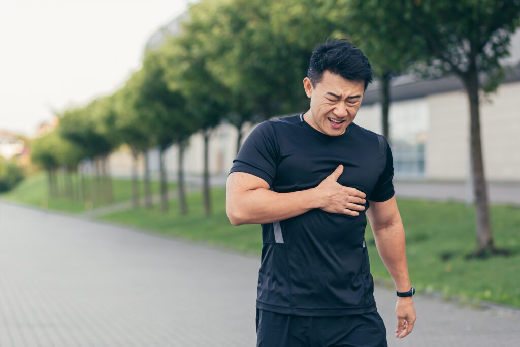 male asian athlete has chest pain fitness in the 2023 11 27 05 07 55 utc